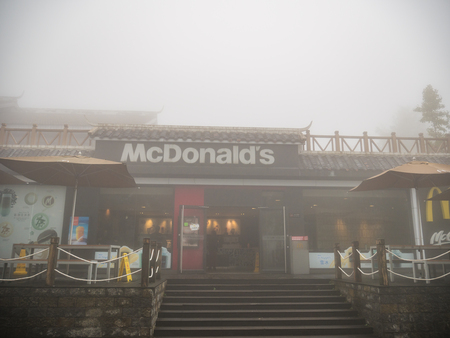 zhangjiajie/China - 14 October 2018: Mcdonald's on tianzi mountain at Zhangjiajie National Forest Park in Wulingyuan District Zhangjiajie City China in the Foggy day.highest Mcdonald's in the worldのeditorial素材