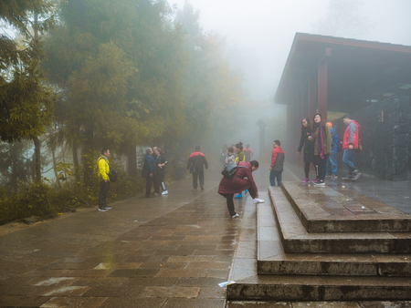 zhangjiajie/China - 14 October 2018: Unacquainted Tourists Walking on tianzi mountain in Zhangjiajie National Forest Park in Wulingyuan District Zhangjiajie City China in the Foggy day.のeditorial素材