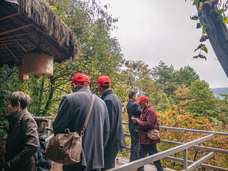 zhangjiajie/China - 14 October 2018: Unacquainted Tourists Walking on tianzi mountain in Zhangjiajie National Forest Park in Wulingyuan District Zhangjiajie City China in the Foggy day.のeditorial素材