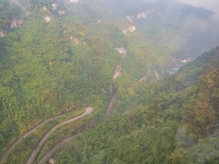 The View of curves road from cable car to tianmen mountain in zhangjiajie city china.Tianmen mountain cable car the longest cableway in the world.の写真素材