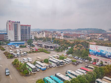 zhangjiajie/China - 15 October 2018:Beautiful zhangjiajie Cityscape view from cable car to tianmen mountain in the morning.Downtown Urban building scene of zhangjiajie city hunan chinaのeditorial素材