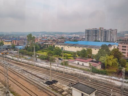 zhangjiajie/China - 15 October 2018:Beautiful zhangjiajie Cityscape and railway  from cable car to tianmen mountain in the morning.Downtown Urban building scene of zhangjiajie city hunan chinaのeditorial素材