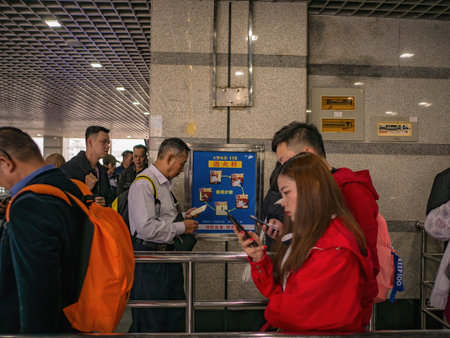 zhangjiajie/China - 15 October 2018:Unacquainted Tourists are queuing at tianmen mountain cable car...