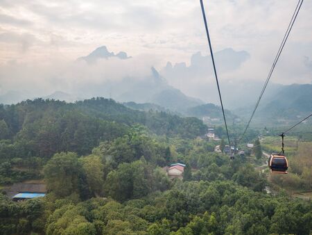 Beautiful zhangjiajie mountain view from cable car to tianmen mountain in the morning.Tianmen mountain cable car the longest cableway in the world.zhangjiajie city chinaのeditorial素材