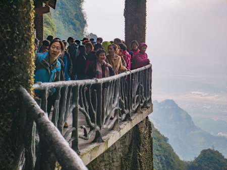 zhangjiajie/China - 15 october 2018:Unacquainted Tourists on Heaven gate cave tianmen mountain...