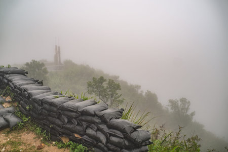 Landscape view with the Heavy fog on Chang suek Hill the border between Thailand-myanmar near etong...