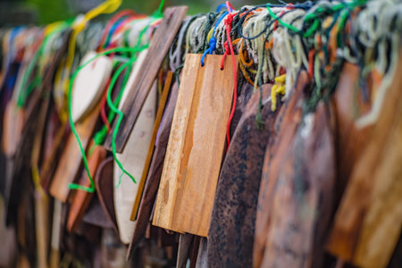 Prayer tags tied to a  on the bridge in the Pilok mine village in kanchanaburi City Thailand.Pilok...