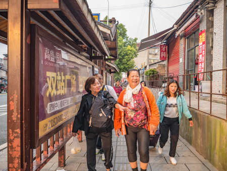 zhangjiajie/China - 16 October 2018:Unacquainted People in Downtown district of Zhangjiajie city in the morning.zhangjiajie City china travelのeditorial素材