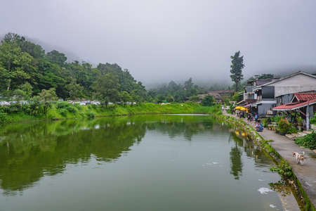 Kanchanaburi/Thailand-1 July 2017:Etong village the hidden village in the mist and the lake in front of village at kanchanaburi city Thailand.Pilok mine The Old mine near the Thai-Myanmar borderのeditorial素材