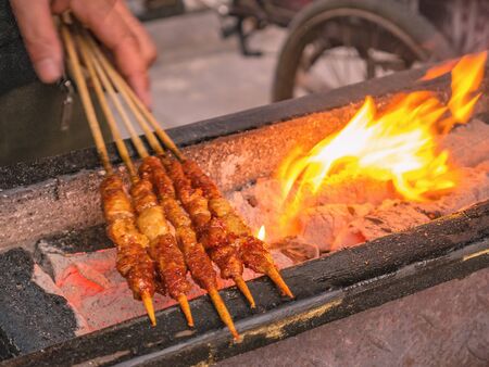 Close up Grill Lamb street food in Fenghuang ancient town.phoenix ancient town or Fenghuang County is a county of Hunan Province, Chinaの写真素材