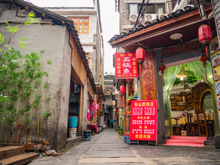 fenghuang,Hunan/China-16 October 2018:Tourist walking in alley building district of Fenghuang...