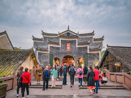 fenghuang,Hunan/China-16 October 2018Unacquainted toursit walk on the bridge cross the river of fenghuang old town.phoenix ancient town or Fenghuang County is a county of Hunan Province, Chinaのeditorial素材