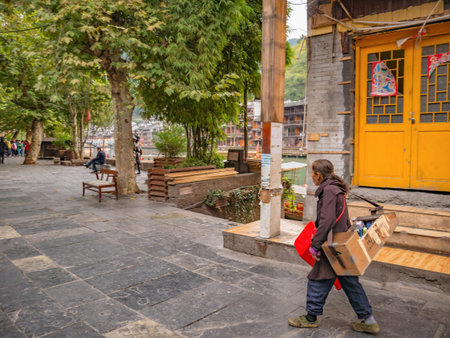 fenghuang,Hunan/China-16 October 2018:Unacquainted people walking in  fenghuang old town .phoenix ancient town or Fenghuang County is a county of Hunan Province, Chinaのeditorial素材