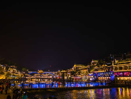 fenghuang,Hunan/China-16 October 2018:Scenery view in the night of fenghuang old town .phoenix ancient town or Fenghuang County is a county of Hunan Province, Chinaのeditorial素材