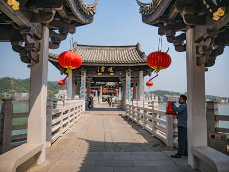Chaozhou/China-02 April 2018:Unacquainted people on Guangji Bridge at Chaozhou City China.also known as Xiangzi Bridge,is an ancient bridge that crosses the Han River east of Chaozhouのeditorial素材
