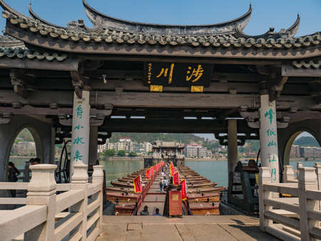 Chaozhou/China-02 April 2018:Unacquainted people on Guangji Bridge at Chaozhou City China.also known as Xiangzi Bridge,is an ancient bridge that crosses the Han River east of Chaozhouのeditorial素材