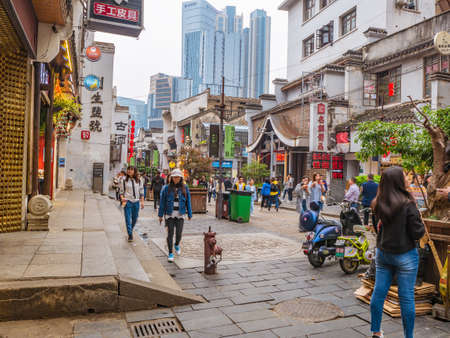 Changsha/China-17 October 2018:Unacquainted People or tourist walking on Taiping old Street at Changsha city hunan China.Taiping old street one of landmark in changsha cityのeditorial素材