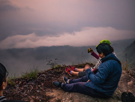 Loei/Thailand-17 Feb 2019:Unacquainted Tourist waiting for sunrise in early morning at Phu Kradueng...