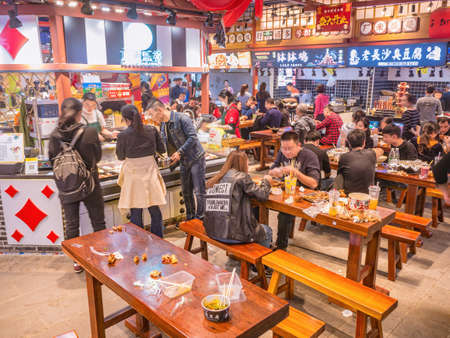 Changsha/China-17 October 2018:Unacquainted People in Street Food Alley at Changsha city China.changsha is the capital and most populous city of Hunan province in chinaのeditorial素材
