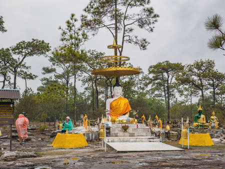 Loei/Thailand-17 Feb 2019:Buddha statue and Unacquainted people  on LanPresrinakarin on top of Phu Kradueng mountain  in Loei City Thailand.Phu Kradueng mountain national park the famous Travel destinationのeditorial素材