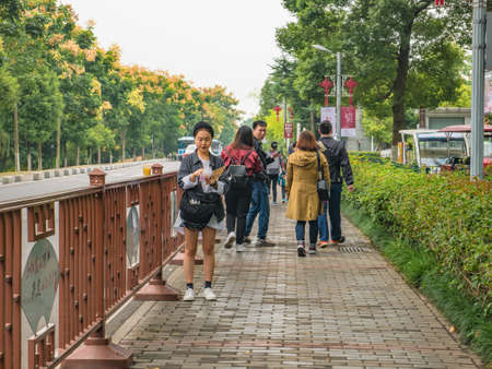 Changsha/China-18 October 2018:Unacquainted people walking on Orange Island Park Changsha city hunan China.changsha is the capital and most populous city of Hunanのeditorial素材