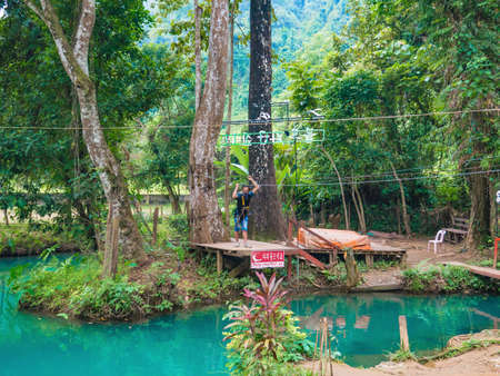Vangvieng/lao-10 Dec 2017:Tourist Playing zipline lagoon at pukham cave vangvieng city Lao.Vangvieng City The famous holiday destination town in Lao.のeditorial素材