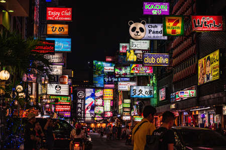 Bangkok/Thailand-3 dec 2019:Unacquainted tourist or people walking in Soi thaniya Silom Road Bangkok Thailand in the night.Silom is undoubtedly one of Bangkok's most important financial districtsのeditorial素材