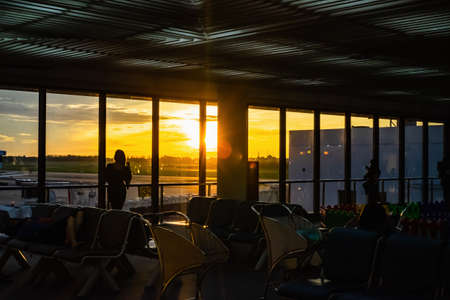 Bangkok/Thailand-22 July 2019:Unacquainted People with Beautiful scenery Sunrise in Don muang internation airport Bagnkok city Thailand.Don Mueang International Airport is one of two international airports serving greater Bangkokのeditorial素材