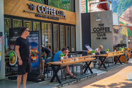Krabi/Thailand-22 July 2017:Unacquainted Tourist relaxing in the Coffee cafe beside Ao nang beach at krabi city Thailand.Krabi - in southern Thailand is one of the most relaxing places on the planet.のeditorial素材