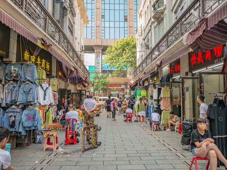 Guangzhou/China-24 Aug 2019:Unacquainted people walking in Shisanhang Clothing Wholesale Marke at guangzhou china.Shisanhang Clothing Wholesale Market is a huge clothes marketのeditorial素材