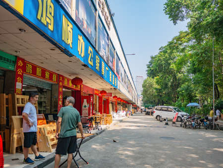 Guangzhou/China-24 Aug 2019:Unacquainted people walking on Furniture Wholesale Marke at guangzhou china.Guangzhou or Canton, the capital of Guangdong Province, is the third largest city in Chinaのeditorial素材
