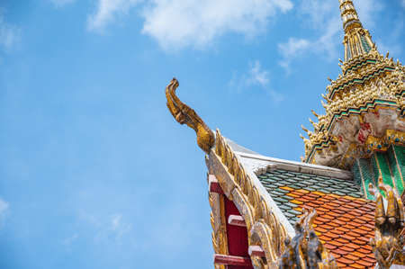 Thailand traditional temple rooftop with blue sky in bangkok city thailand.の写真素材