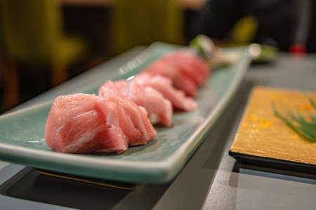 Close up Otoro sushi or tuna blue fin sushi on the plate in japanese restaurant.の写真素材