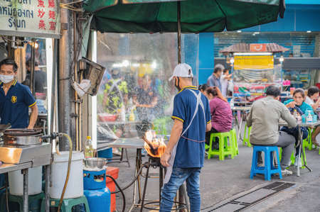 Bangkok/Thailand-18 June 2020:Unacquainted Chef cooking in Yaowarat china town at bangkok city Thailand in Chinese newyear.Bangkok Chinatown is the largest Chinatown in the world.のeditorial素材