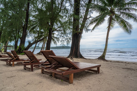 Wooden chair beside the beach with beautiful idyllic seascape view on kohkood island.Koh Kood, also known as Ko Kut, is an island in the Gulf of Thailandの写真素材