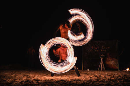 Trat/thailand-21/09/2020:Fire dancer on kohkood island in low season travel.Koh Kood, also known as Ko Kut, is an island in the Gulf of Thailandのeditorial素材