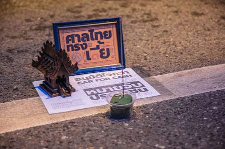 Bangkok/thailand-29/10/2020:Small Thai court shrine and incense burner for praying for justices and democracy in thailand on Silom road.thailand Anti-government mob also known as free youth.のeditorial素材
