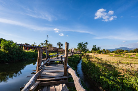 Beautiful nature and landscape view of wooden bridge Ban Tai Lue CafÃ© at pua District nan.Nan is a rural province in northern Thailand bordering Laosの写真素材