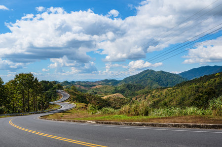 Road No.1081 way from Pua District to Bo Kluea District, Nan THAILAND.The famous view point and that tourists must stop by to check in at nan. Curvy road looks like number 3.の写真素材