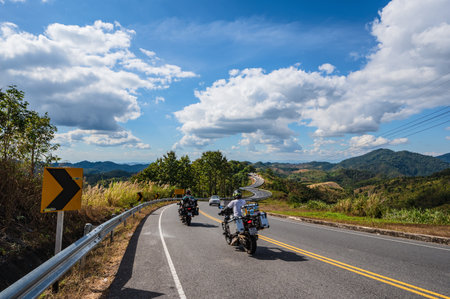 Nan.thailand-19.12.2021:Road No.1081 way from Pua District to Bo Kluea District, Nan THAILAND.The famous view point and that tourists must stop by to check in at nan. Curvy road looks like number 3.のeditorial素材