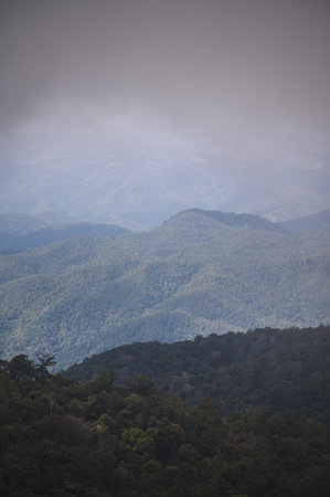 Beautiful landscape view on the mountain at monjong mountain.Doi Mon Jong is one of the top ten peaks in Thailand. Its beautiful landscape is filled with mountain ranges and pretty flowersの写真素材