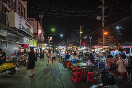 Kanchanaburi.thailand-15.01.2022:Unacquainted people at night market at Kanchanaburi city thailand.のeditorial素材