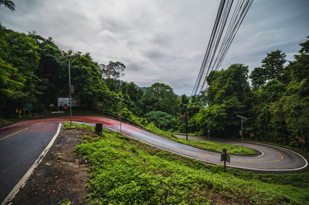 sharp curve road on koh chang trat thailand.Ko Chang island, known also as 'Elephant Island' named because of its elephant shaped headlandの写真素材