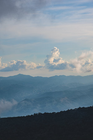 Beautiful landscape view and layers mountain on the monjong mountain.Doi Mon Jong is one of the top ten peaks in Thailand. Its beautiful landscape is filled with mountain ranges and pretty flowersの写真素材