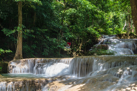 Landscape view of Erawan waterfall kanchanaburi thailand.Erawan National Park is home to one of the most popular falls in the thailand.First floor of erawan waterfall âHlai Khuen Rungâの写真素材