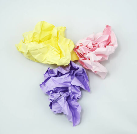 Crumpled Color Paper isolated on white backgroundの写真素材