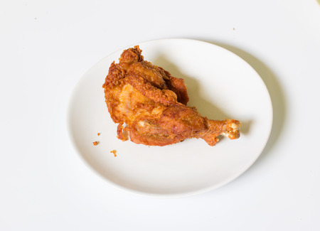 delicious  crispy  fried chicken in  the white dish on a wooden table , close up delicious fried chicken , close upの写真素材