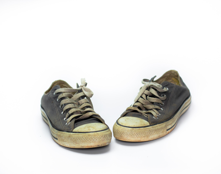 close up Dirty shoe on isolate white background , close up shoe,dirty blue shoes on the white background , canvas blue shoes ,old shoe,sneaker shoeの写真素材