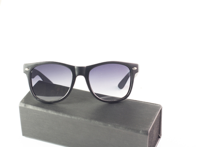 glasses on the white isolate background , money and coin watch pass the glassesの写真素材
