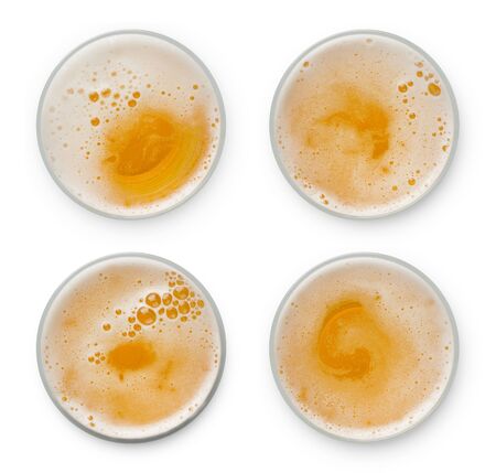 beer bubbles in glass cup on white background. top view collection isolated on white background.の写真素材